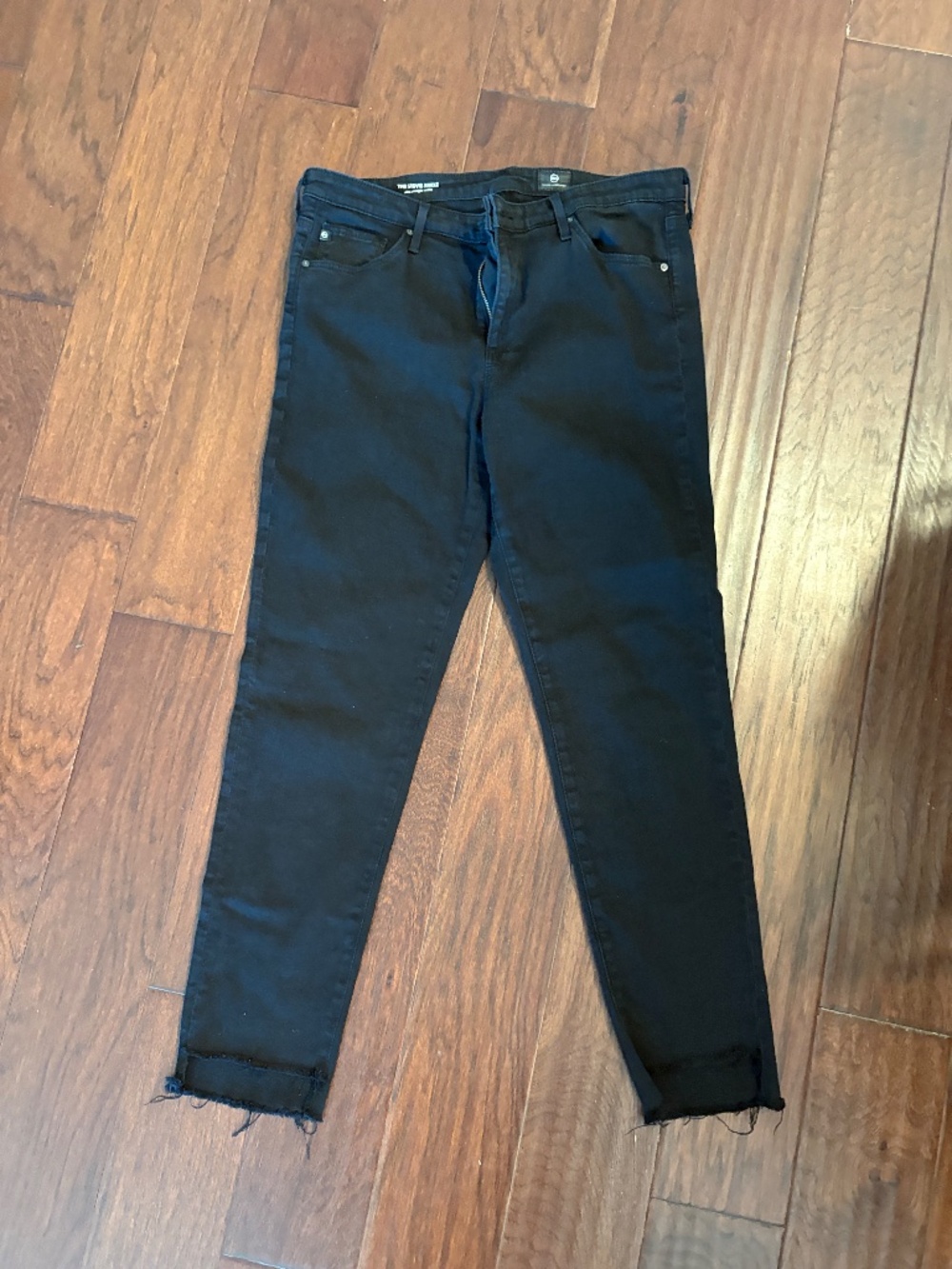 AG denim black skinny jeans fray hem size 32